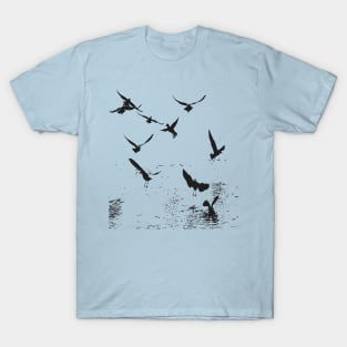 Silhouette Of A Flock Of Seagulls Scavenging Black T-Shirt